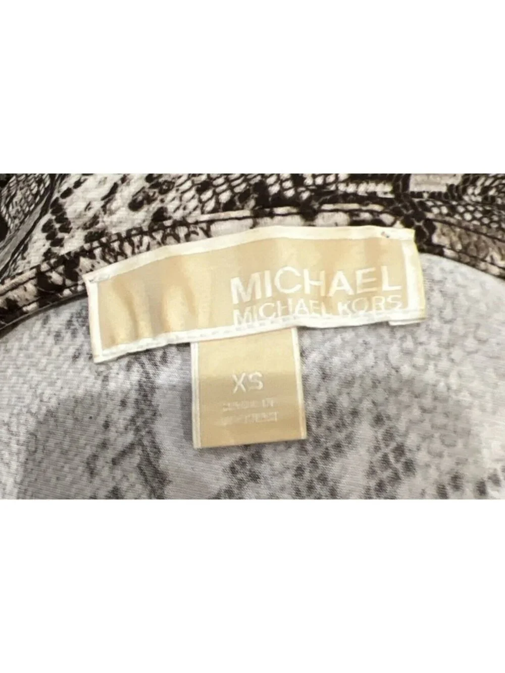 Michael Kors slither into